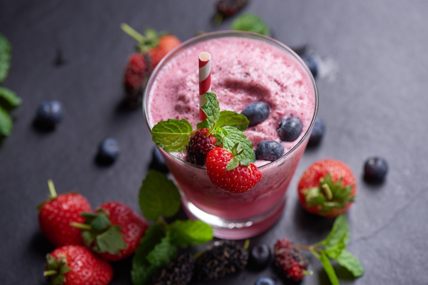 Berry smoothie with fresh fruit and mint